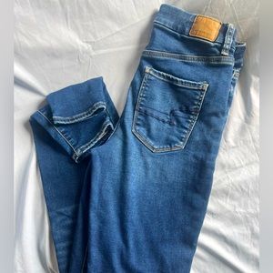 American Eagle Next level stretch ripped skinny jeans. Size 4 x-long